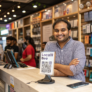 a-cute-indian-and-cheerful-mobile-shop-owner-stand a-cute-indian-and-cheerful-mobile-shop-owner-stand