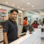 a-image-headshot-of-a-modern-saloon-indian-shop-ow